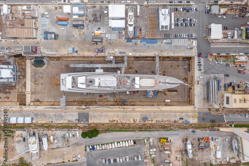 Photography Aerial view of sea dry dock in La Ciotat city, France, the cargo crane, boats on