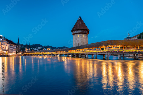 Famous Chapel Bridge, the city's symbol and one of the Switzerland's main tourist attractions, Switzerland. Historic city center of Lucerne