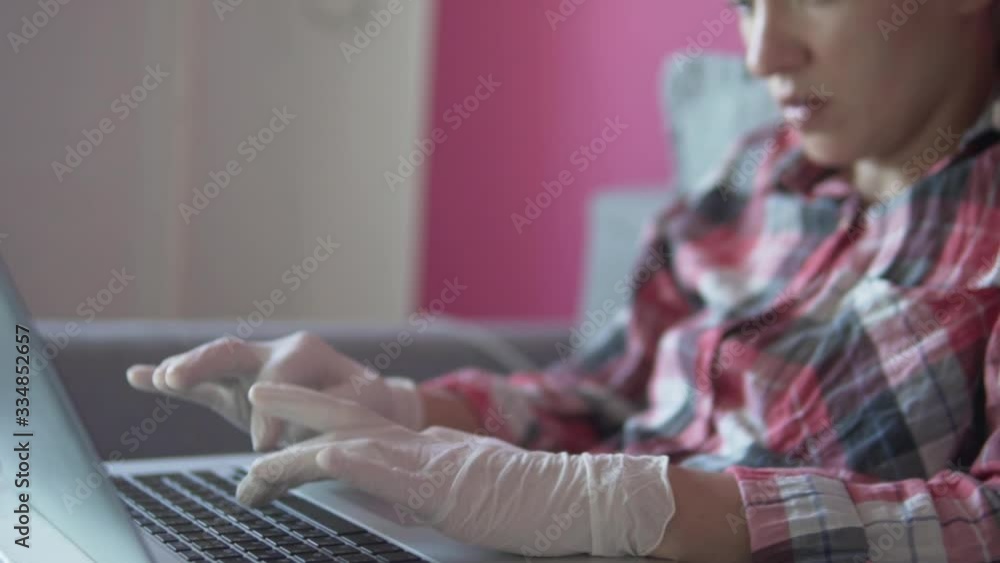 A woman works from home during the coronavirus pandemic in Russia. A woman works from home during the coronavirus pandemic in Russia.