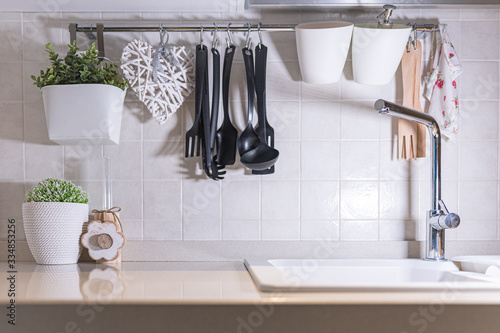 Wooden table top on blur kitchen room background. For displaying the assembly product or visual arrangement of the configuration keys