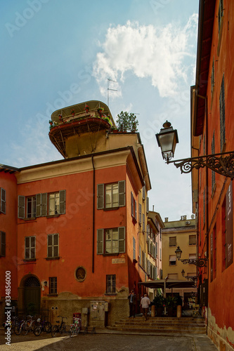 Bright and colorful Italian cityscape. Sunlit streets. Colorful houses. Warm and comfortable.