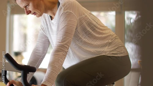 woman doing fitness at home photo