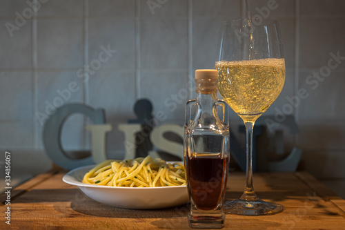  spaghetti with Cetara anchovy sauce. with glass of white wine