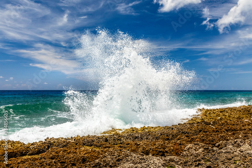 Spray from the famous Blow Holes on the south coast of Grand Cayman