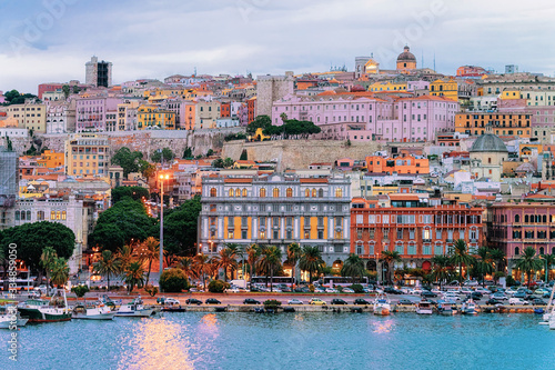 Cityscape with marina in Mediterranian sea Cagliari evening