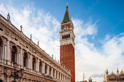 St. Mark's Square in Venice. Tall bell tower on a sunny day.