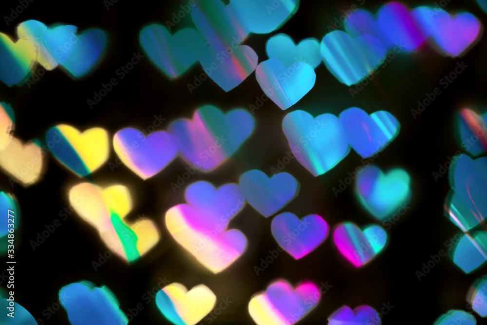 Colourful heart bokeh festive background. Trendy holographic colors. For Christmas,Valentine's day greeting cards, invitations, flyers, blog posts, party banners design. Colourful heart bokeh festive background. Trendy holographic colors. For Christmas,Valentine's day greeting cards, invitations, flyers, blog posts, party banners design.
