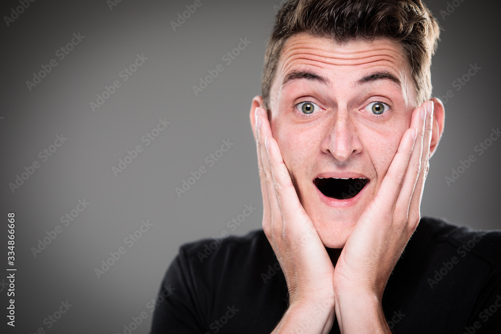 Fear/anxiety/regret/uncertainty in a young man - effects of a difficult life situation - vivid emotions concept Fear/anxiety/regret/uncertainty in a young man - effects of a difficult life situation - vivid emotions concept