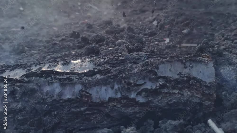 Exploded Land Explosion on the surface of the earth from an explosive device, hit by ...