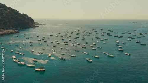 Spain Costa Brava Mediterranean coastline panning from the sea shore, Canyelles Grosses, Roses, Catalonia