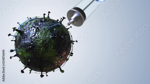 covid-19. a syringe punctures the cell of the virus and the virus dies. virus vaccine.