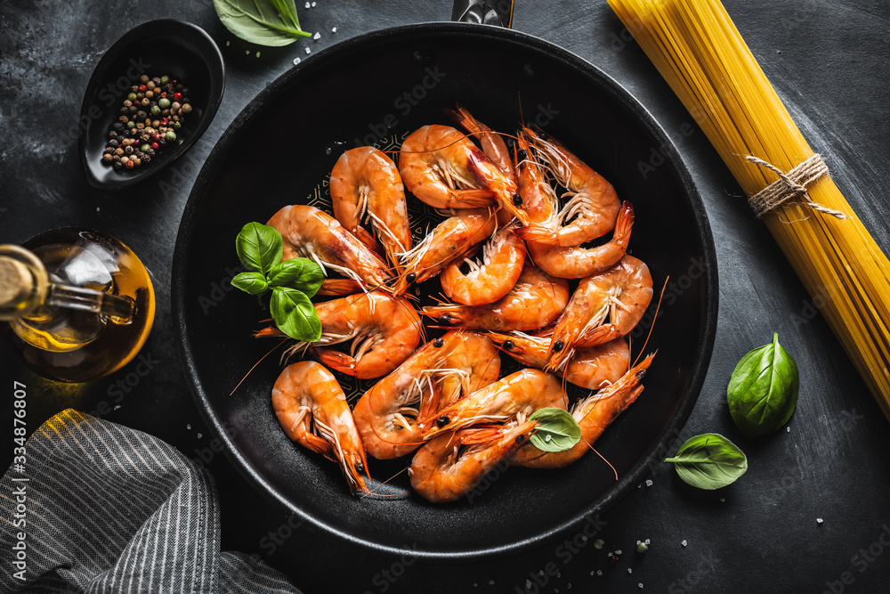 Fried shrimps with spices on pan Fried shrimps with spices on pan