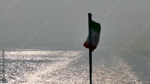 Wallpaper Mural Handheld shot of the national flag of Iran waving in wind on the back of a speedboat inside Persian gulf Torontodigital.ca