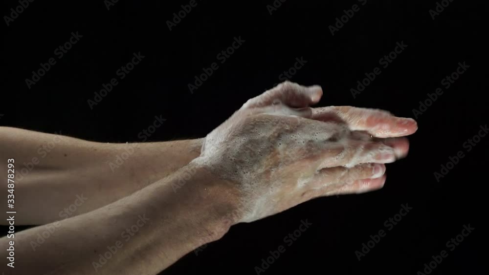 hand washing on black background hand washing on black background