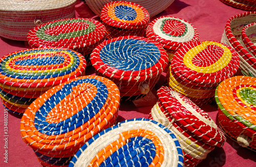 Crafts. Colorful straw bags. Jequia da Praia, Alagoas, Brazil on December 11, 2005