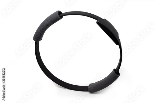 A grey exercise ring to stay fit. Device used with videogame controllers.