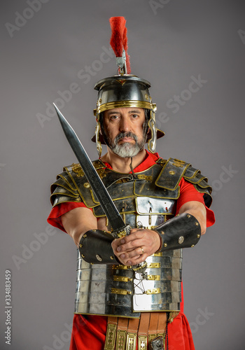 Fotografie Roman Soldier holding a sword