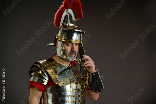 Roman soldier in actitude of refleccion photo