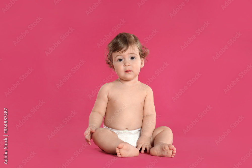 Cute little baby in diaper on pink background Cute little baby in diaper on pink background