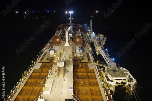 Tanker vessel at terminal during night © remipiotrowski