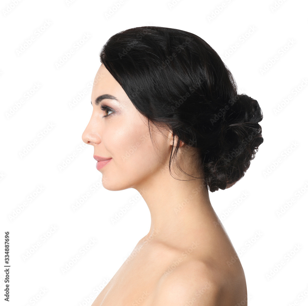 Naklejka premium Portrait of young woman with beautiful hair on white background