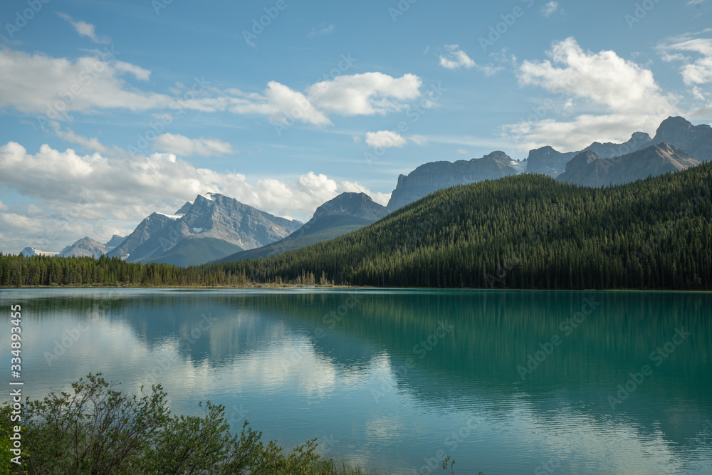 Image of lake in the mountains with reflection Image of lake in the mountains with reflection