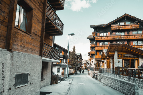 Landscape Scenery View Old Town Valley of Zermatt City, Switzerland. Cityscape Scenic of Traditional Architecture of Swiss Culture Against Mountain Alps. Travel Destination and Europe Vacation.