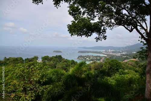 Fototapeta Naklejka Na Ścianę i Meble -  sea, sky, landscape, tree, nature, blue, summer, water, beach, green, mountain, clouds, view, trees, forest, beautiful, island, travel, ocean, coast, bay, lake, scenic, park, seascape