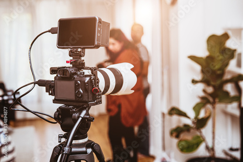 Cinematography Mirrorless Digital Camera equipments setup for record video footage production in studio. photo