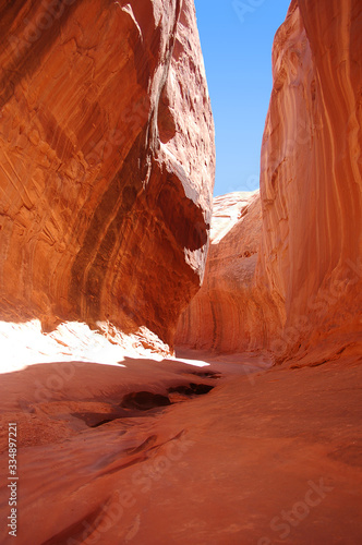 Play of light and shadow in a slot canyon in the North wash canyon country of Southern Utah.