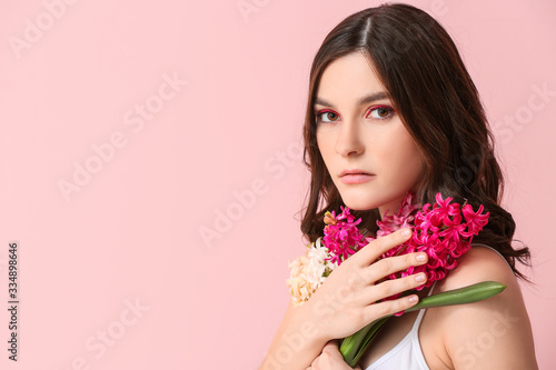 Beautiful young woman with ...