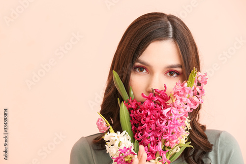 Beautiful young woman with ...