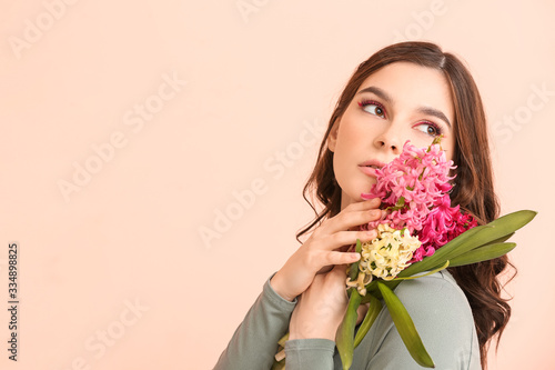 Beautiful young woman with ...
