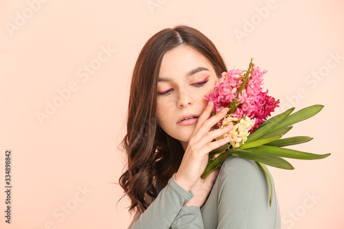 Beautiful young woman with ...