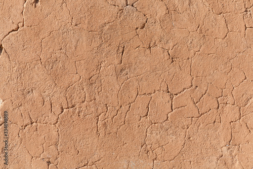 Detail of a cracked clay wall