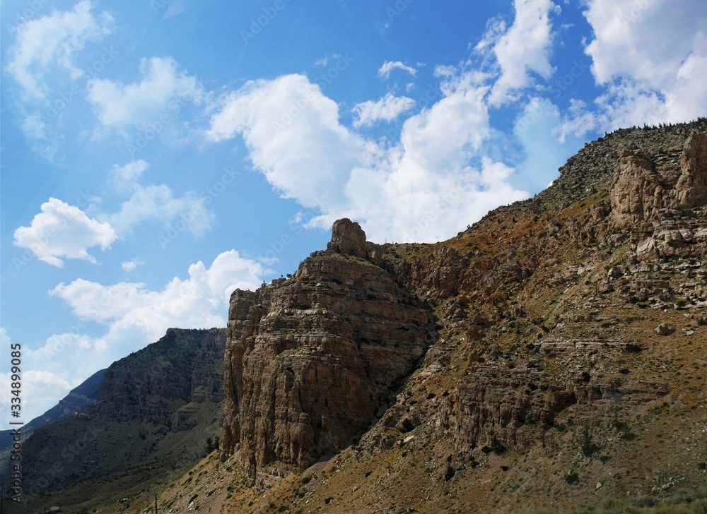 Buttes and geologic formations seen along the road from North Fork Highway in Wyoming. Buttes and geologic formations seen along the road from North Fork Highway in Wyoming.