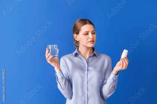 Young woman with medicine o...