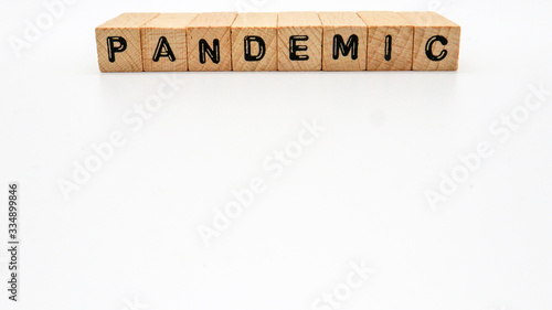 Wooden Text Block of "PANDEMIC" on Isolated Background