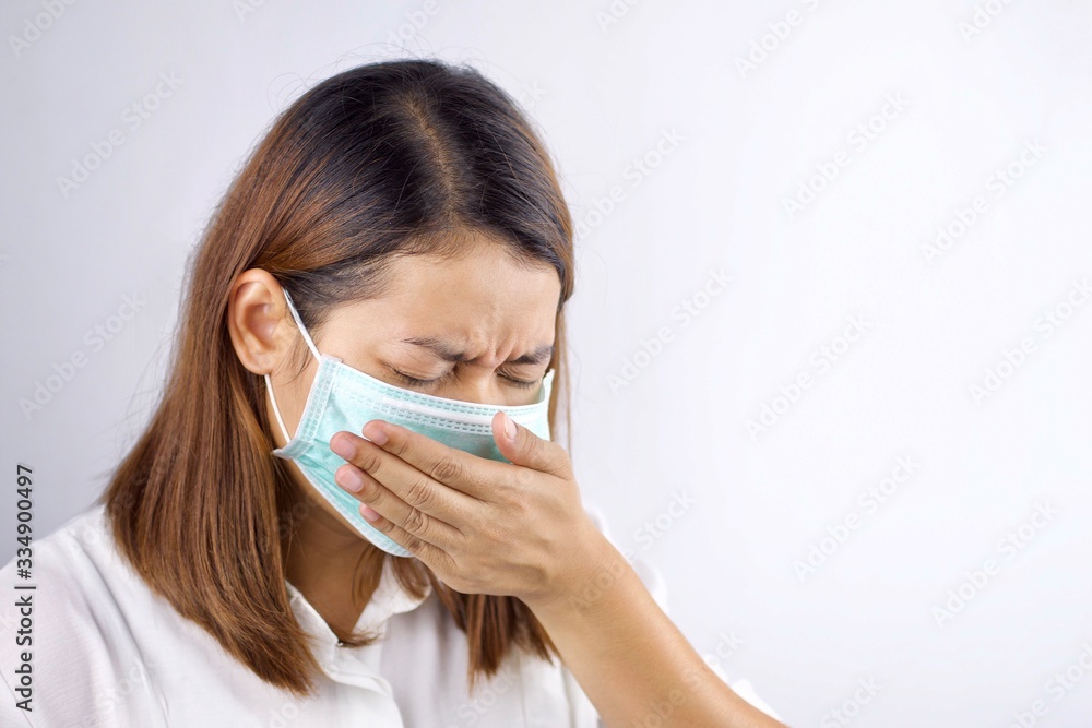 Health concepts, women wearing masks She is sick and has a fever. Due to getting a virus or caused by a weak body. Health concepts, women wearing masks She is sick and has a fever. Due to getting a virus or caused by a weak body.