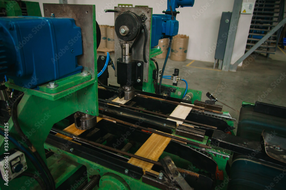 conveyor for the production of wooden boxes for storing fruits and vegetables. woodworking factory for the production of boxes. wooden box making machine conveyor for the production of wooden boxes for storing fruits and vegetables. woodworking factory for the production of boxes. wooden box making machine