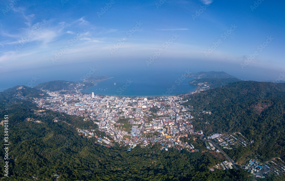 Ultra wide panorama of Patong, Phuket. Aerial view of the sea bay and the city surrounded by mountains