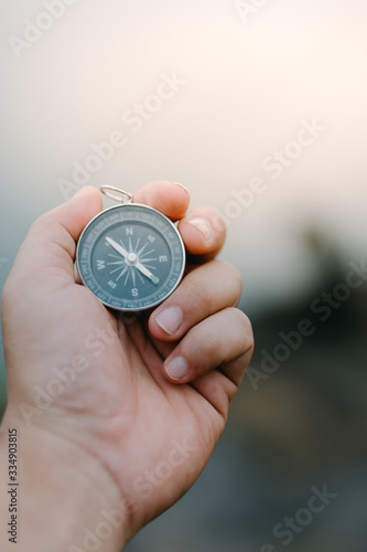 compass in hand isolated on white background