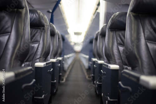 Center aisle of a commercial airplane.