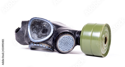 Vintage gasmask isolated on white - Green filter © michaklootwijk