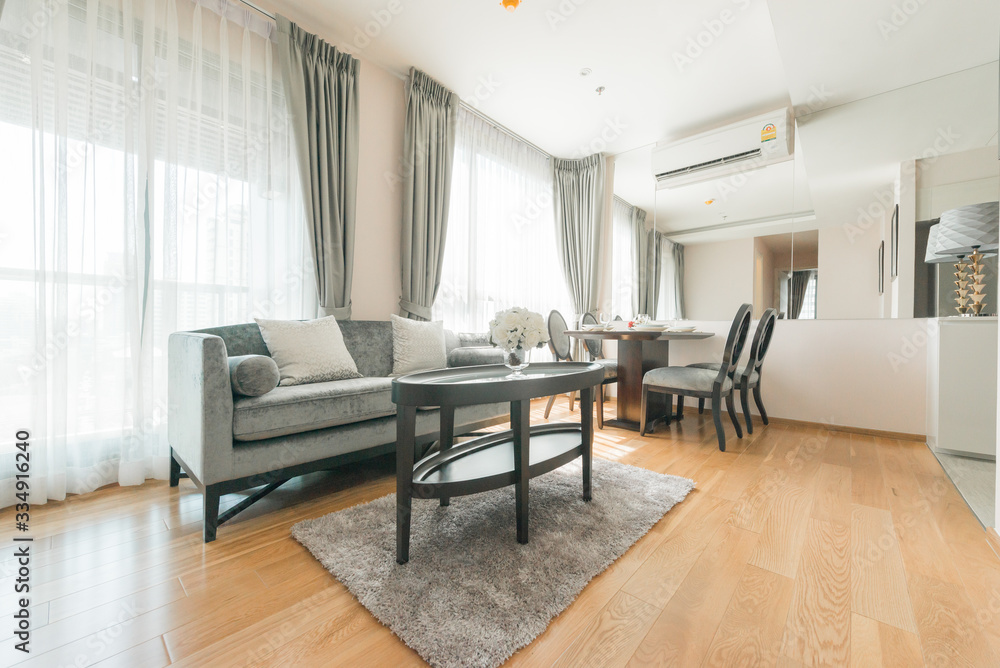 Fototapeta premium Modern living room and kitchen in small apartment 