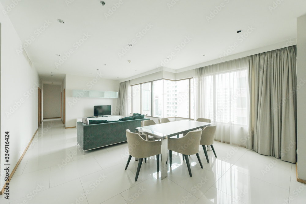 Modern living room and kitchen in small apartment Modern living room and kitchen in small apartment