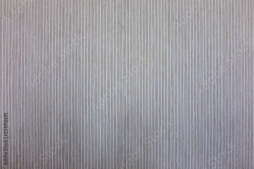 Fototapeta Naklejka Na Ścianę i Meble -  Textures, backgrounds, homogeneous gray wallpapers on the wall of a room interior. Flat, gray wallpaper on the wall.