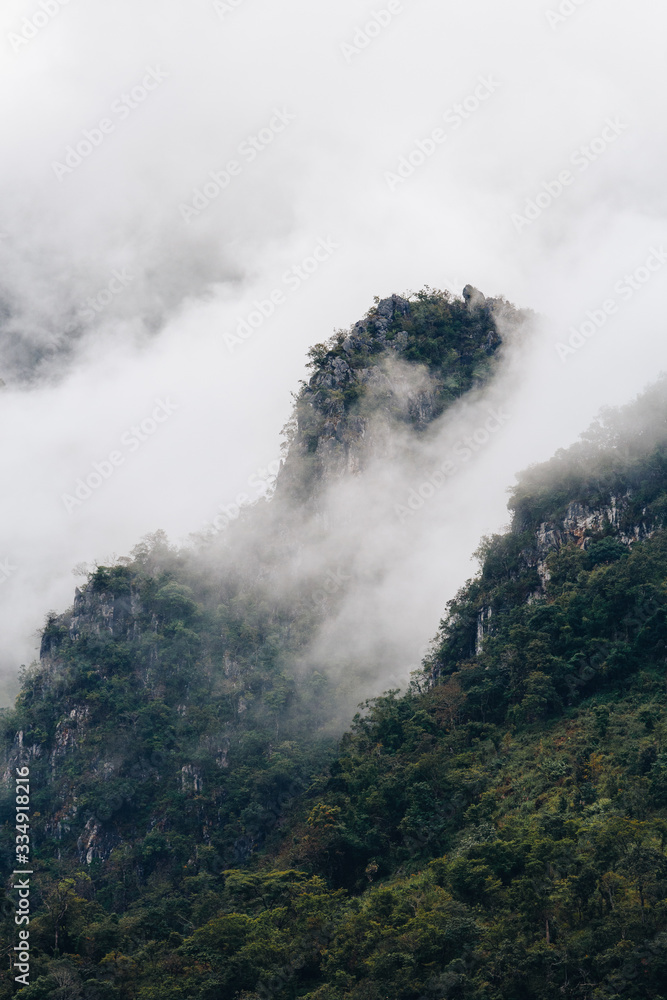 A landscape with fog and the nice view of mountains and forest at Chiang Dao, Thailand