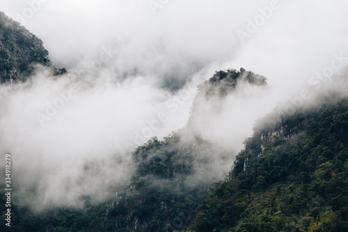 A landscape with fog and the nice view of mountains and forest at Chiang Dao, Thailand © kanjanaporn