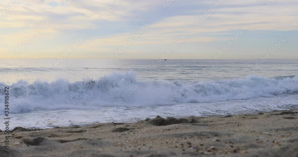 Pacific Ocean Beach sand and surf Carlsbad California. Beautiful southern California, Pacific Ocean beach and coastal highway. Vacation sea front homes and resorts. Waves and surf on sand and rocks. Pacific Ocean Beach sand and surf Carlsbad California. Beautiful southern California, Pacific Ocean beach and coastal highway. Vacation sea front homes and resorts. Waves and surf on sand and rocks.